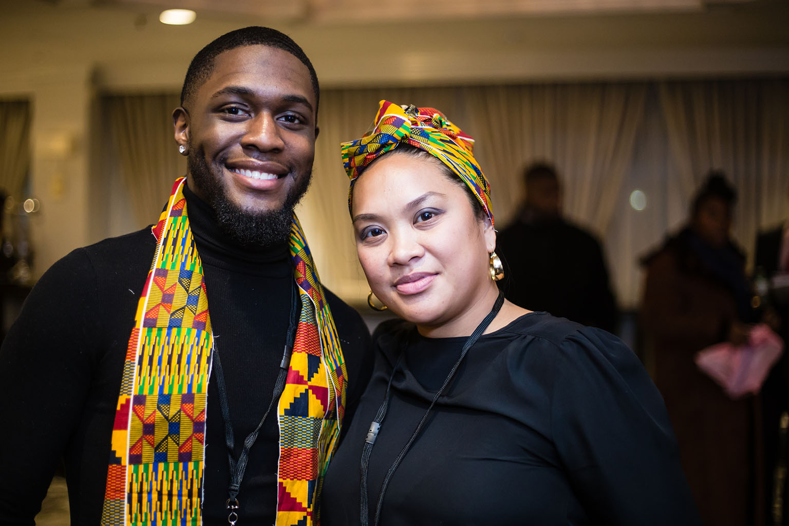 A Man and a Woman in a Colorful Scarf