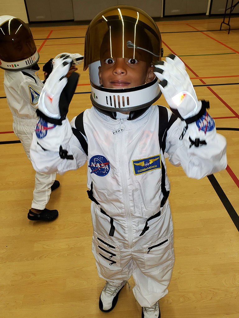 A Little Boy in an Astronaut Costume